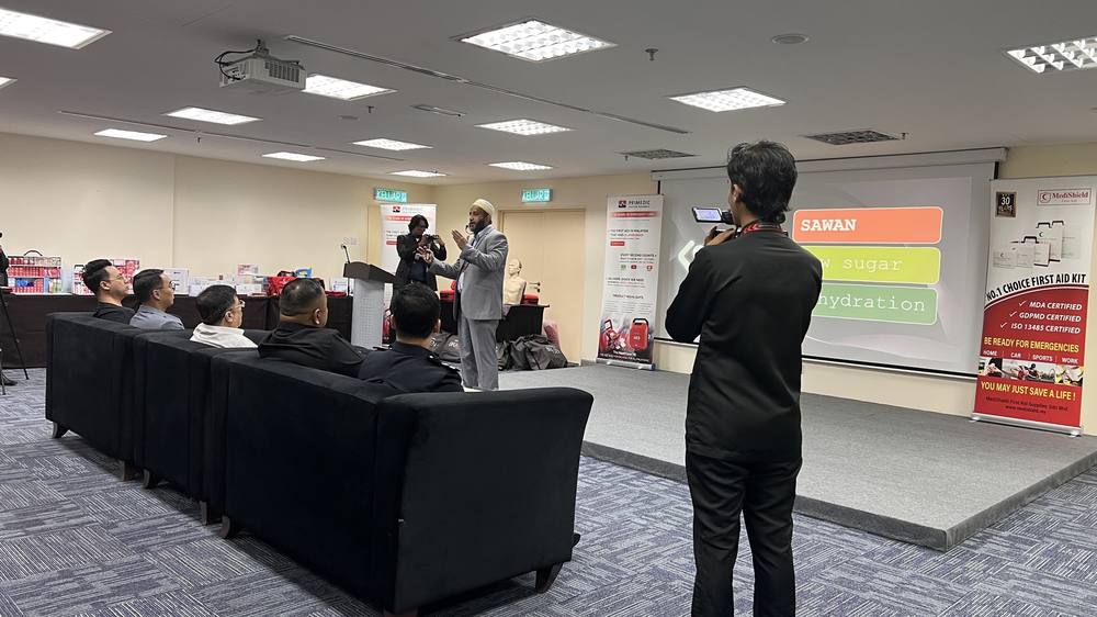 Dr. Onn on stage at a health event